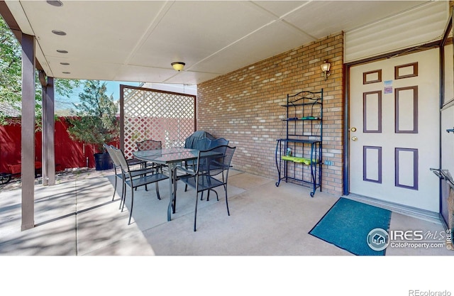729 Jay Pl, Berthoud, CO 80513 - view of patio featuring fence and outdoor dining area