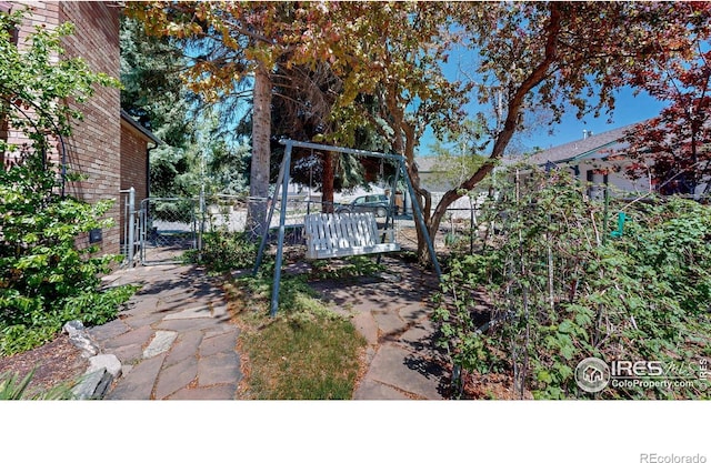 729 Jay Pl, Berthoud, CO 80513 - view of yard featuring a gate and fence