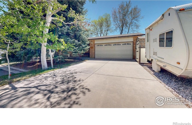 729 Jay Pl, Berthoud, CO 80513 - exterior space featuring concrete driveway and an attached garage