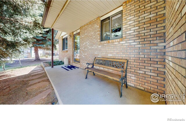 729 Jay Pl, Berthoud, CO 80513 - view of patio featuring a porch