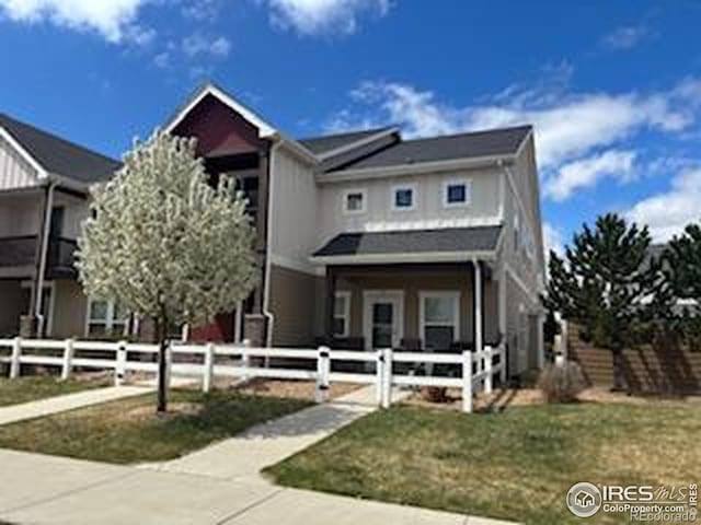 3051 County Fair Ln Unit 1, Fort Collins, CO 80528 - view of front of house featuring a fenced front yard