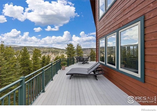 139 Ponderosa Dr, Nederland, CO 80466 - wooden terrace featuring outdoor dining space