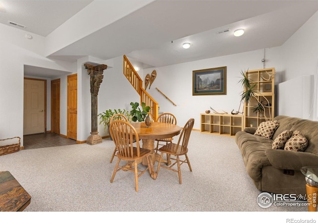 139 Ponderosa Dr, Nederland, CO 80466 - dining area featuring carpet, stairs, and baseboards