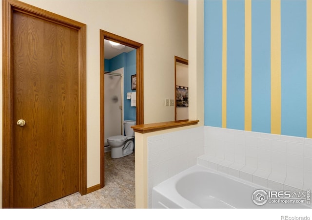3500 Carlton Ave Unit 34, Fort Collins, CO 80525 - bathroom featuring toilet, a shower with shower door, and a bath