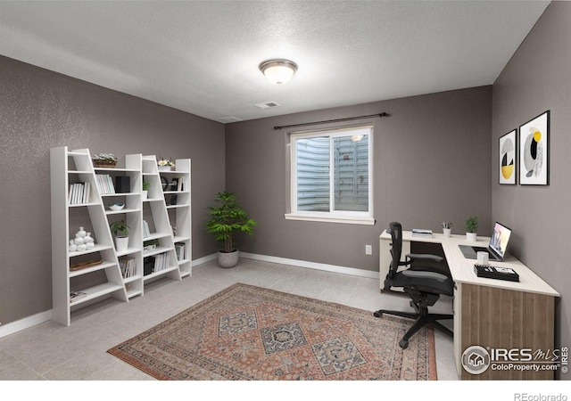 7548 County Road 100, Wellington, CO 80549 - office with a textured ceiling and baseboards
