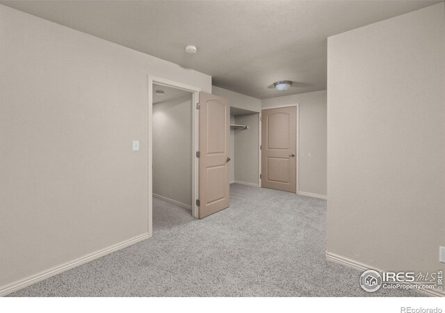 7548 County Road 100, Wellington, CO 80549 - carpeted spare room featuring baseboards