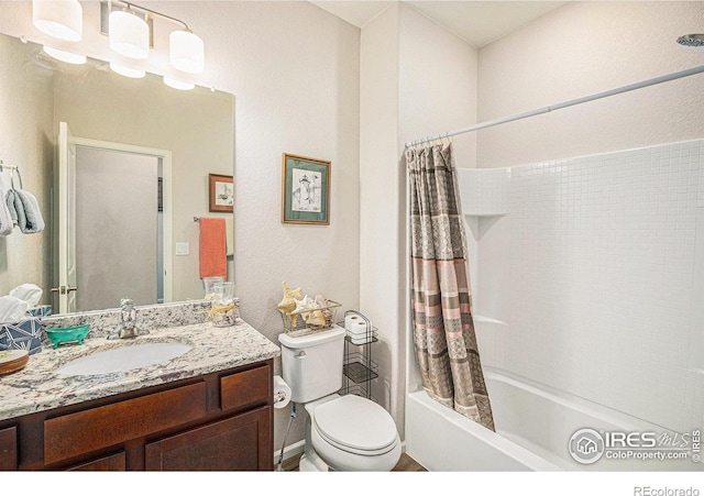 bathroom with toilet, shower / bathtub combination with curtain, and vanity