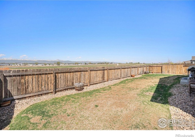 view of yard featuring a fenced backyard