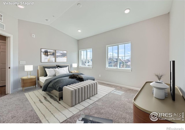 carpeted bedroom with baseboards, recessed lighting, vaulted ceiling, and visible vents