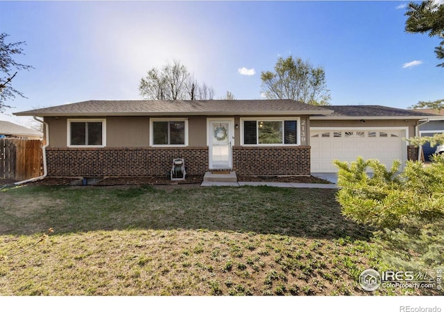 2139 Donna Ct, Loveland, CO 80537 - ranch-style home featuring brick siding, an attached garage, fence, and a front lawn