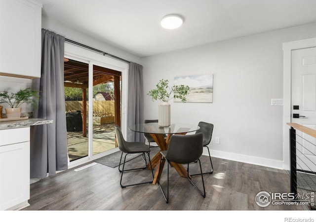 2139 Donna Ct, Loveland, CO 80537 - dining room with baseboards and dark wood-style floors
