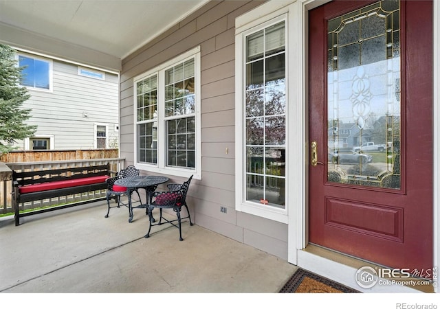 665 Glenarbor Cir, Longmont, CO 80504 - view of exterior entry with a porch