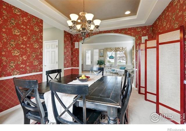 665 Glenarbor Cir, Longmont, CO 80504 - dining space featuring an inviting chandelier, carpet floors, and wallpapered walls