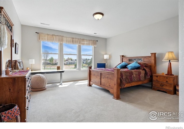 665 Glenarbor Cir, Longmont, CO 80504 - bedroom with visible vents and carpet