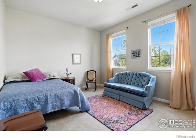 665 Glenarbor Cir, Longmont, CO 80504 - bedroom featuring carpet floors, baseboards, and visible vents