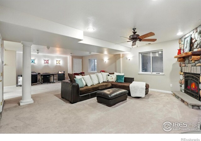 665 Glenarbor Cir, Longmont, CO 80504 - carpeted living area with ceiling fan, decorative columns, a stone fireplace, baseboards, and recessed lighting