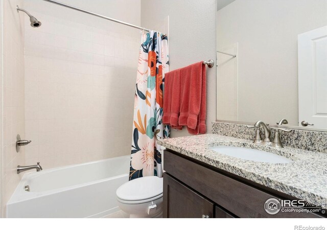 719 Wagon Bend Rd, Berthoud, CO 80513 - bathroom featuring toilet, shower / bathtub combination with curtain, and vanity