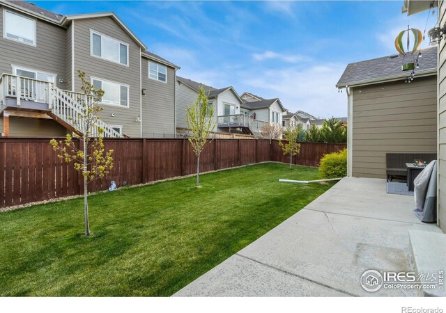 719 Wagon Bend Rd, Berthoud, CO 80513 - view of yard with a patio, a fenced backyard, and a residential view