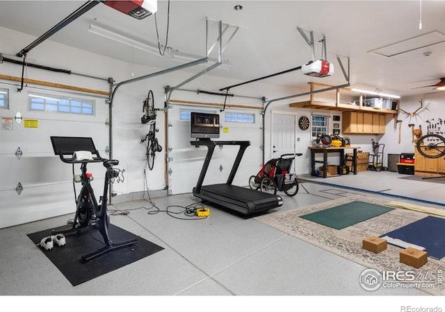 exercise room with a garage