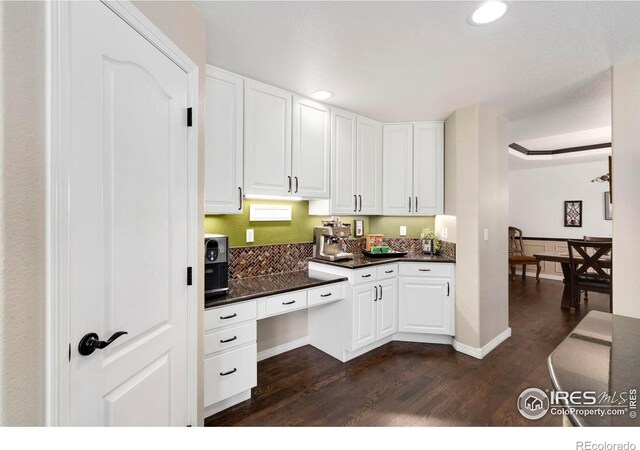5442 Tiller Ct, Windsor, CO 80528 - kitchen featuring dark countertops, white cabinetry, recessed lighting, baseboards, and dark wood-style floors