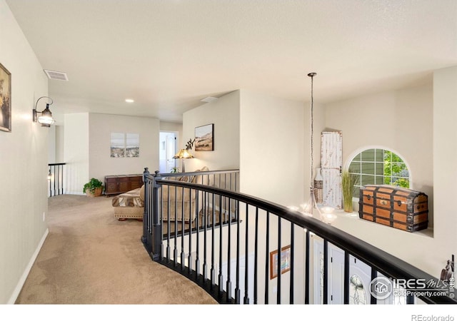 5442 Tiller Ct, Windsor, CO 80528 - hall with visible vents, baseboards, an upstairs landing, carpet flooring, and recessed lighting