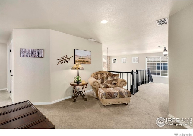 5442 Tiller Ct, Windsor, CO 80528 - carpeted living room with visible vents and baseboards