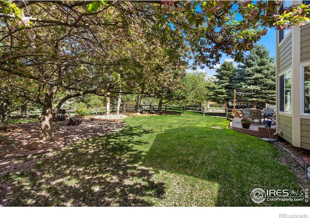 5442 Tiller Ct, Windsor, CO 80528 - view of yard with a patio area and fence