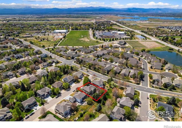 5442 Tiller Ct, Windsor, CO 80528 - birds eye view of property featuring a water and mountain view and a residential view