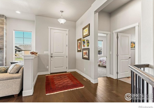 3558 Prickly Pear Dr, Loveland, CO 80537 - entrance foyer featuring recessed lighting, baseboards, visible vents, and wood finished floors
