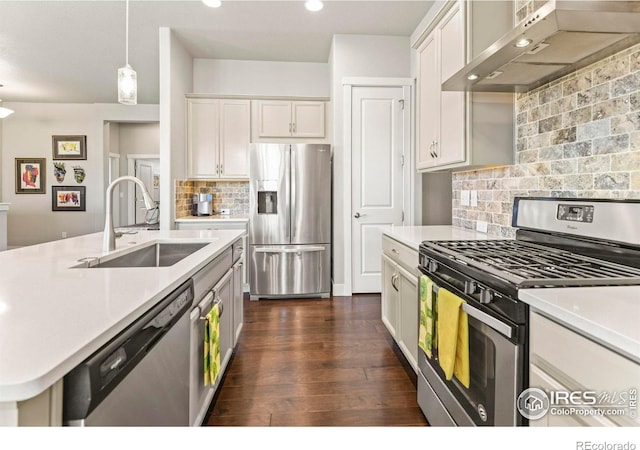 3558 Prickly Pear Dr, Loveland, CO 80537 - kitchen with light countertops, a sink, extractor fan, and stainless steel appliances