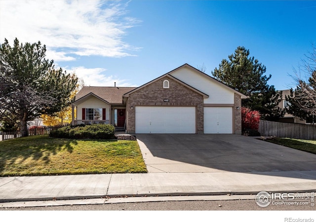 single story home featuring an attached garage, fence, brick siding, and concrete driveway