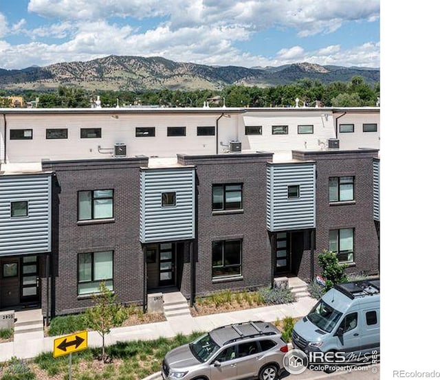 2907 32nd St, Boulder, CO 80301 - view of building exterior with a mountain view