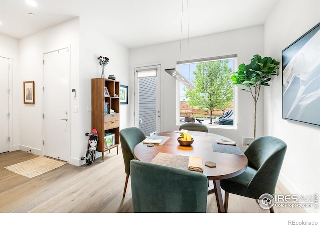 2907 32nd St, Boulder, CO 80301 - dining space featuring light wood-style flooring and baseboards
