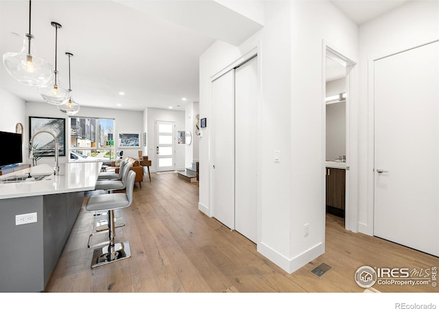 2907 32nd St, Boulder, CO 80301 - hallway with light wood-style floors, recessed lighting, and baseboards
