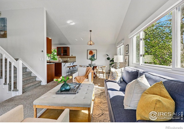 3812 Howe Ct, Boulder, CO 80301 - living room featuring stairway and high vaulted ceiling