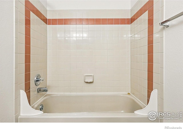 3812 Howe Ct, Boulder, CO 80301 - bathroom with a textured wall and washtub / shower combination