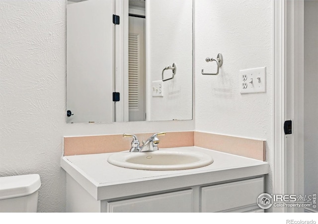 3812 Howe Ct, Boulder, CO 80301 - half bathroom with vanity and toilet