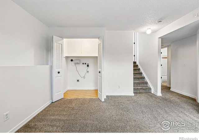 3812 Howe Ct, Boulder, CO 80301 - below grade area with carpet floors, stairway, and baseboards