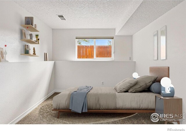 3812 Howe Ct, Boulder, CO 80301 - carpeted bedroom with a textured ceiling and baseboards