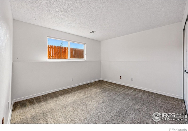 3812 Howe Ct, Boulder, CO 80301 - empty room with carpet, baseboards, and a textured ceiling