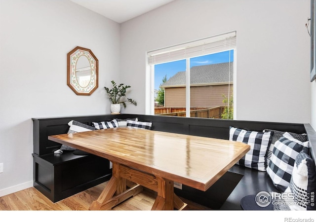 1689 Maseca Plaza Way, Severance, CO 80550 - dining space with baseboards, wood finished floors, and breakfast area