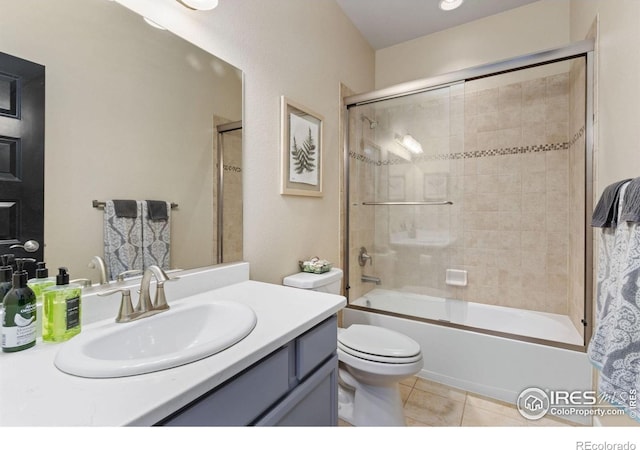 1689 Maseca Plaza Way, Severance, CO 80550 - bathroom featuring tile patterned floors, washtub / shower combination, vanity, and toilet