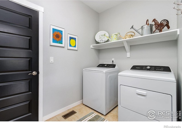 1689 Maseca Plaza Way, Severance, CO 80550 - clothes washing area with laundry area, visible vents, light tile patterned flooring, baseboards, and separate washer and dryer