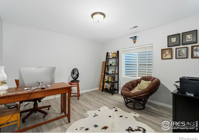 1689 Maseca Plaza Way, Severance, CO 80550 - office featuring baseboards, light wood-style flooring, and visible vents