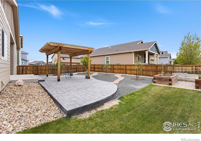 1689 Maseca Plaza Way, Severance, CO 80550 - view of yard with a pergola, a fenced backyard, and a patio area