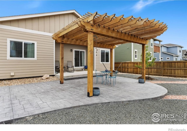1689 Maseca Plaza Way, Severance, CO 80550 - view of patio featuring a pergola and fence