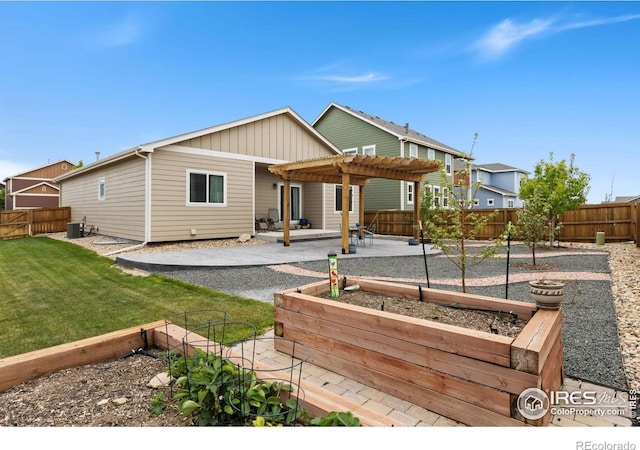 1689 Maseca Plaza Way, Severance, CO 80550 - rear view of house with central AC, a pergola, a fenced backyard, a vegetable garden, and a patio area