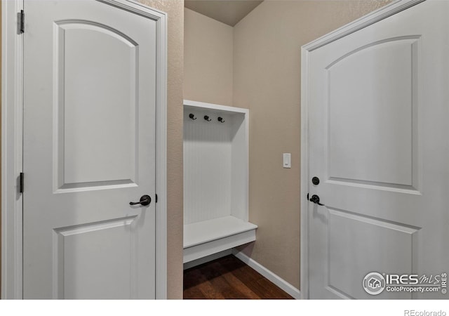 850 Prairiestar Dr, Berthoud, CO 80513 - mudroom featuring baseboards and dark wood-style flooring