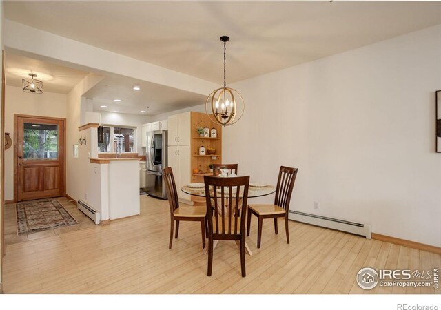 1460 Quince Ave Unit S102, Boulder, CO 80304 - dining room with a baseboard radiator, a chandelier, light wood-style floors, baseboards, and recessed lighting