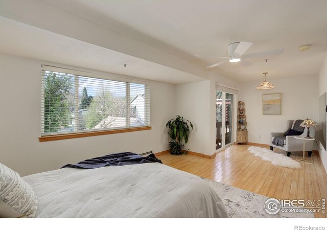 1460 Quince Ave Unit S102, Boulder, CO 80304 - bedroom with wood-type flooring and baseboards